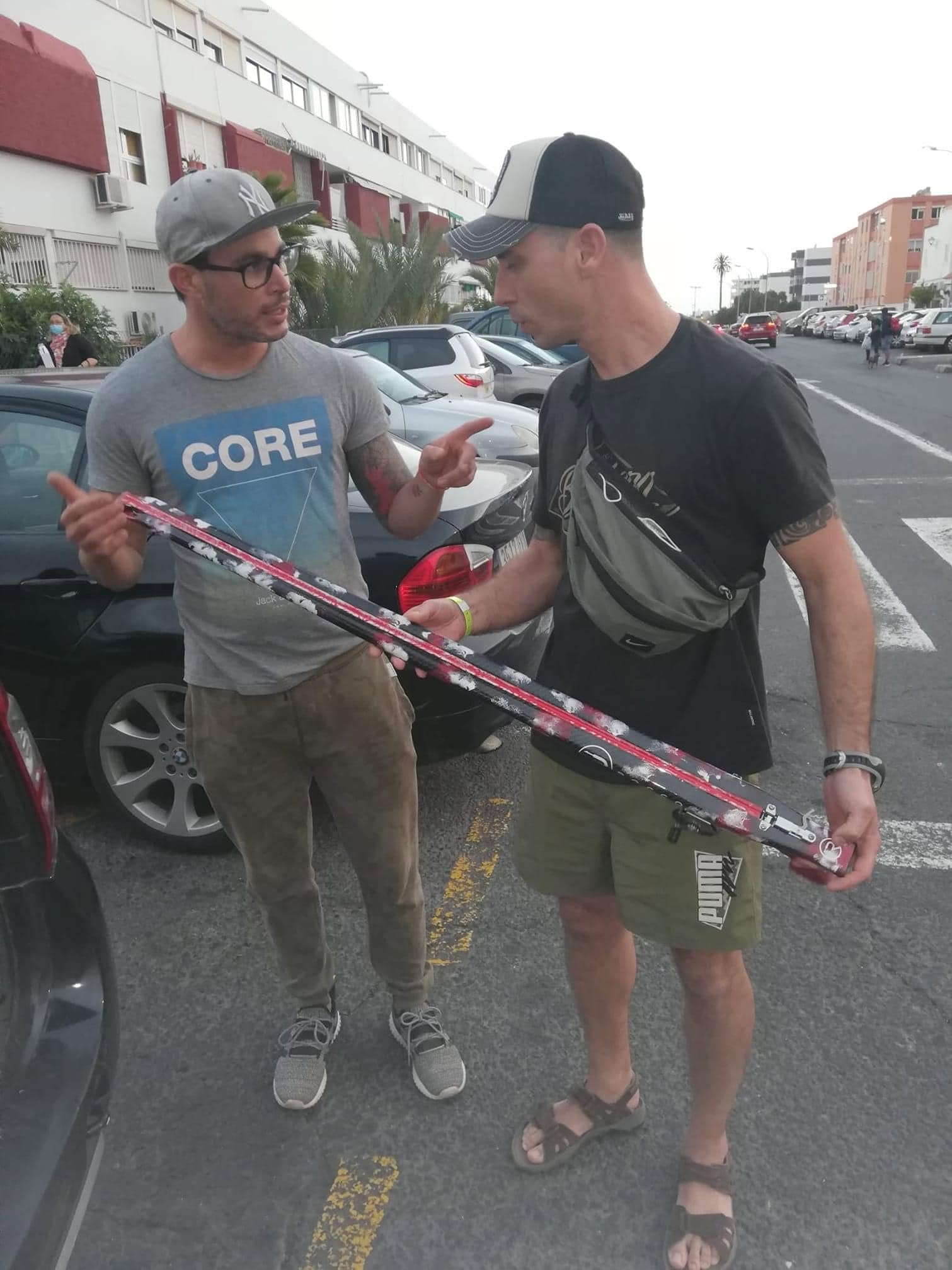 Carlos handing over a finished speargun